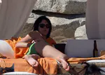 ​Katy Perry和Travis McCoy在墨西哥海滩度过圣诞