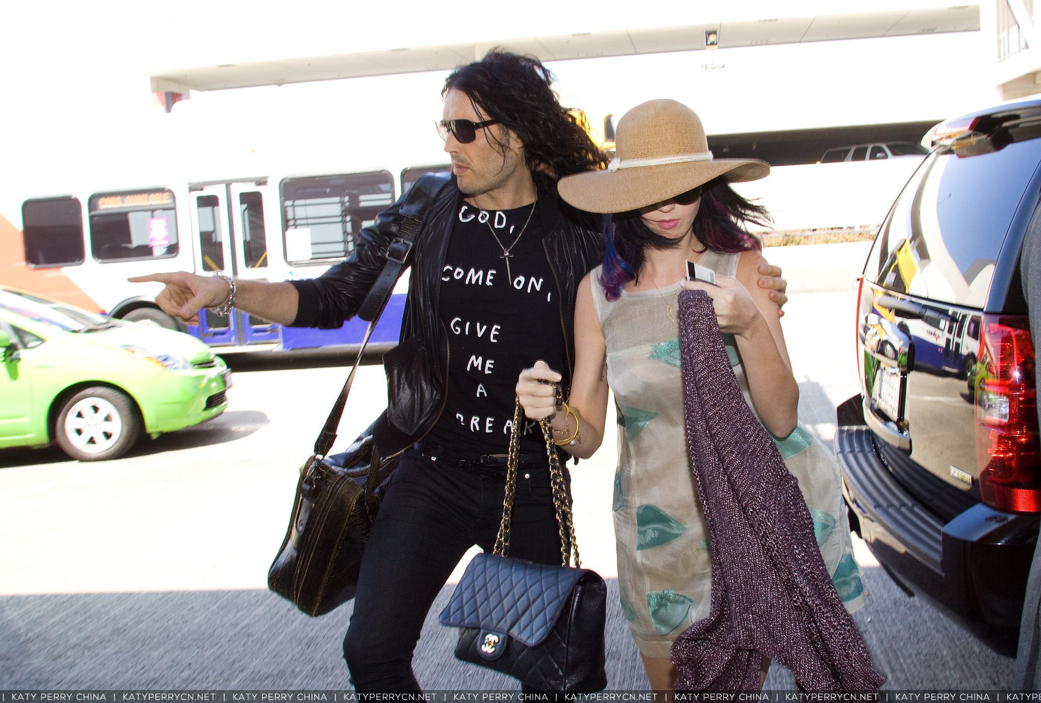 Russell Brand and Katy Pery arriving together at LAX airport to catch a flight. 