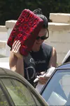 ​Katy Perry heads out of a friend's Los Angeles house