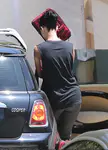 ​Katy Perry heads out of a friend's Los Angeles house